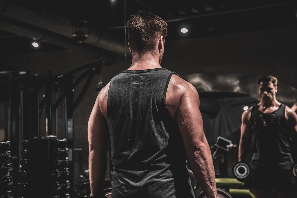 Fit male athlete preparing nutritious meal